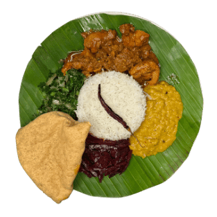 Sri Lankan rice and curry on a banana leaf