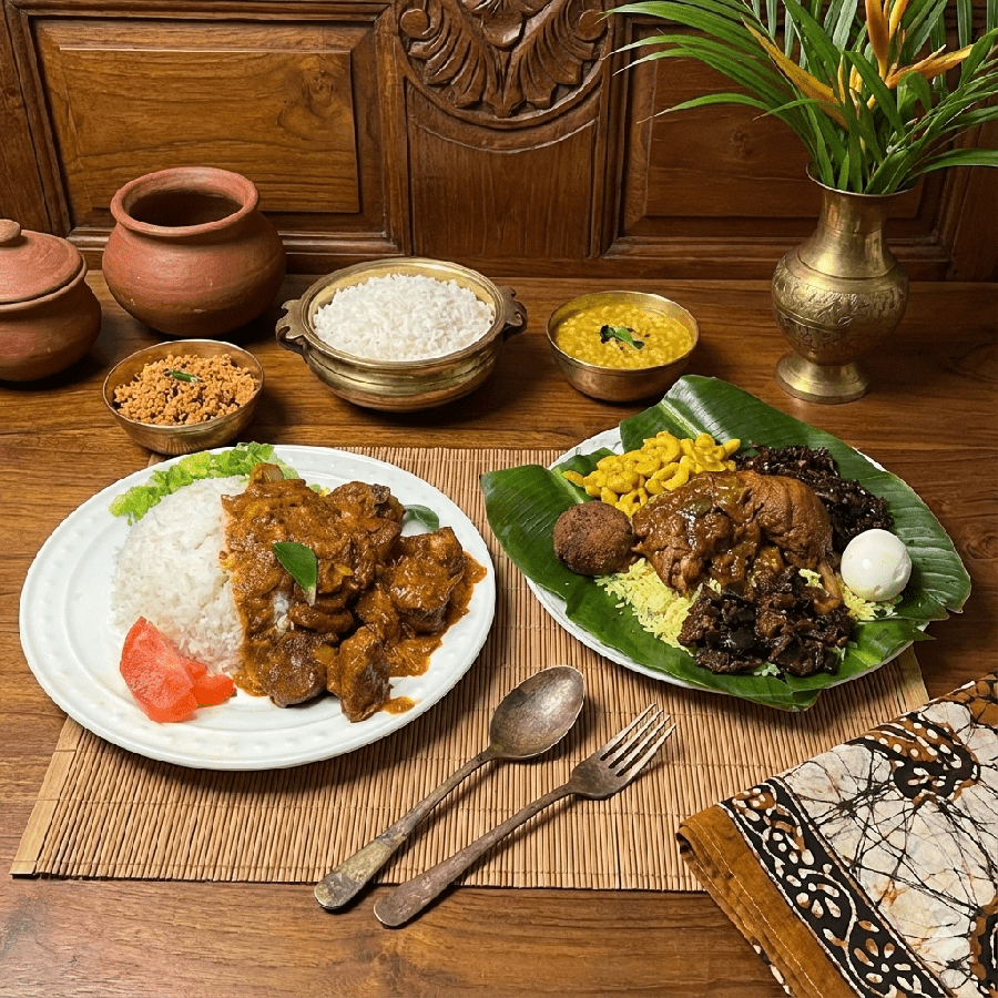 A Sri Lankan table — rice and curry, daal, sambols, clay pots and banana leaf